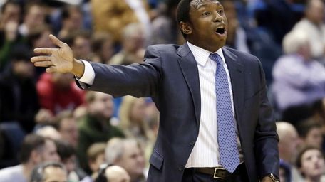 Brooklyn Nets head coach Avery Johnson reacts to