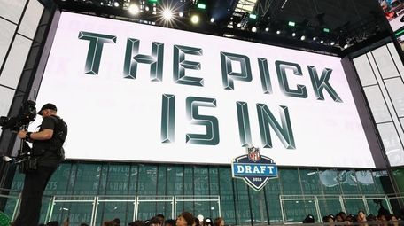 A video board displays the text "THE PICK