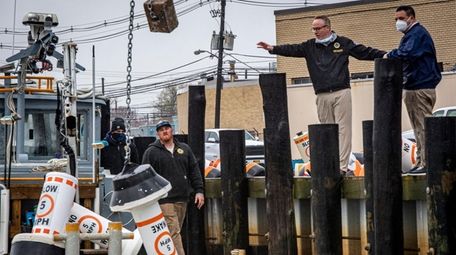 Hempstead Town Supervisor Don Clavin, second from right,