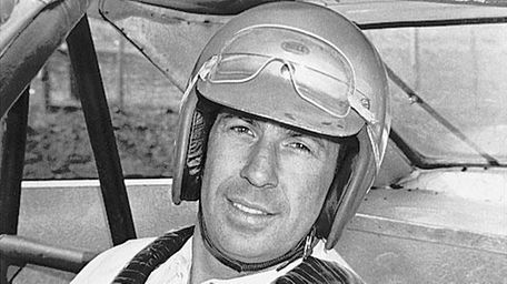 Ned Jarrett poses in the early days of