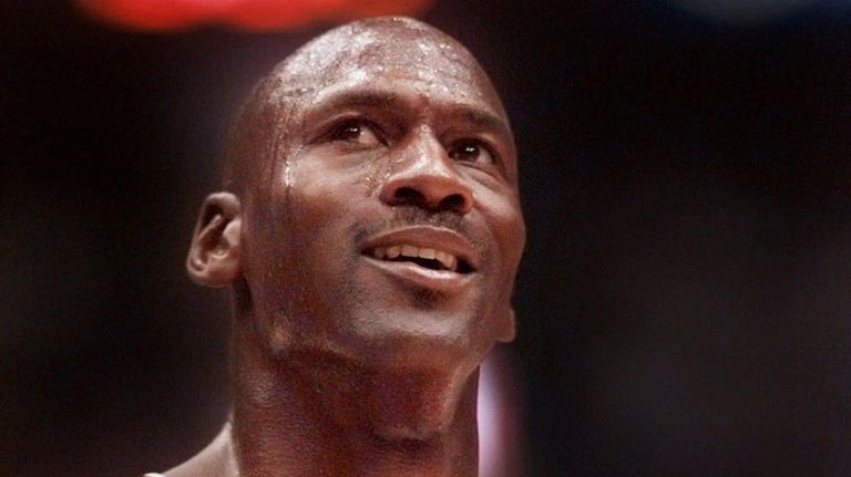 Michael Jordan looks up at the score during