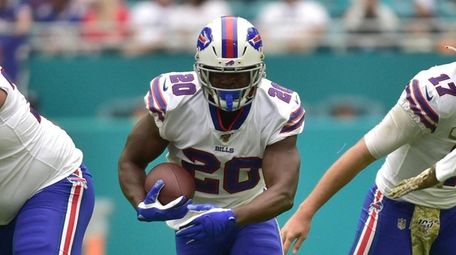 Frank Gore of the Buffalo Bills carries the