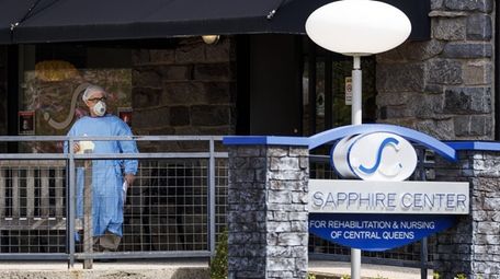 A man in protective gear stands at the
