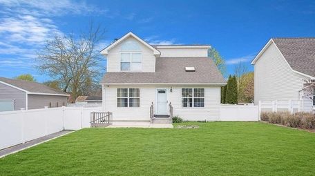 The house has a spacious fully fenced back