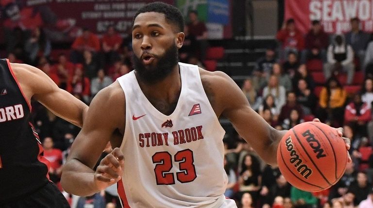 Stony Brook guard Andrew Garcia drives the ball