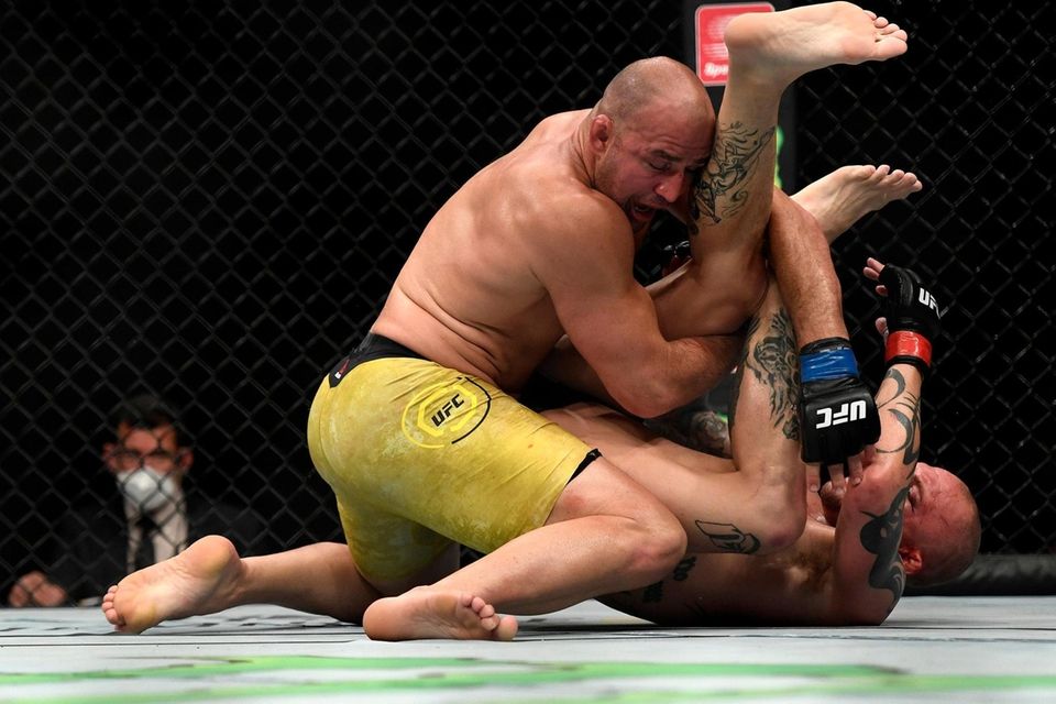 JACKSONVILLE, FLORIDA - MAY 13: Glover Teixeira (top)