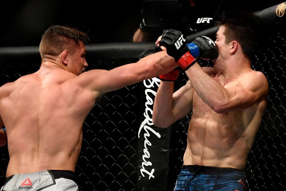 Drew Dober (L) of the United States fights