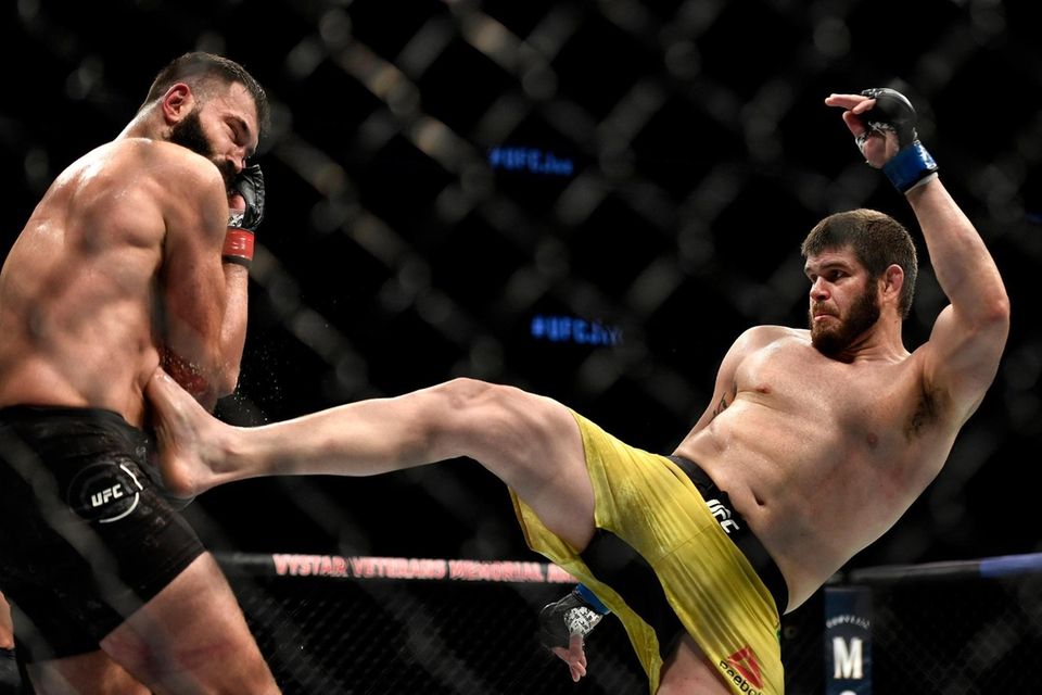 JACKSONVILLE, FLORIDA - MAY 13: Andrei Arlovski (L)