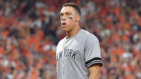 Yankees rightfielder Aaron Judge reacts after he is
