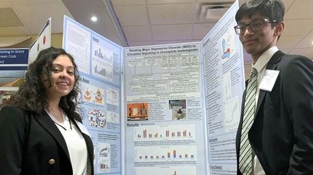 Manhasset High School juniors Taylor Fox, left, and