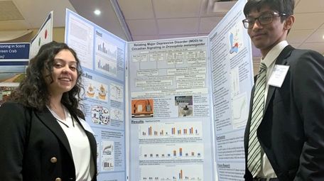 Manhasset High School juniors Taylor Fox, left, and