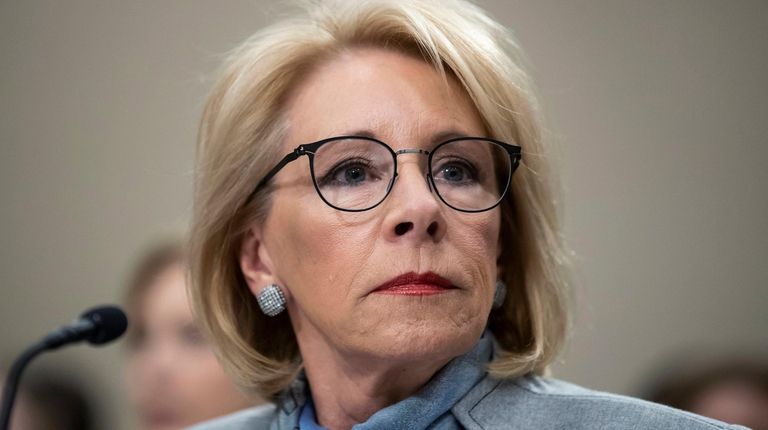 Education Secretary Betsy DeVos testifies during a hearing