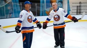 Bob Nystrom, left, and John Tonelli take part