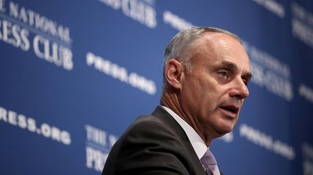 MLB Commissioner Rob Manfred speaks at the National