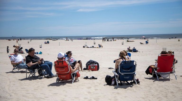 Beach-goers keep their distance at Jones Beach State