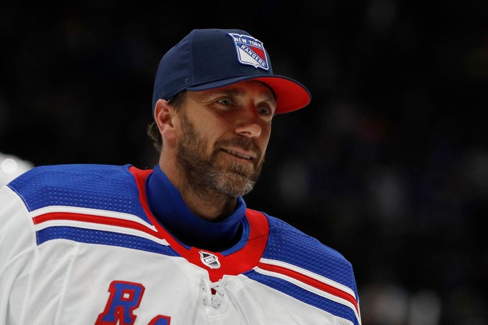 Henrik Lundqvist skates off the ice after a