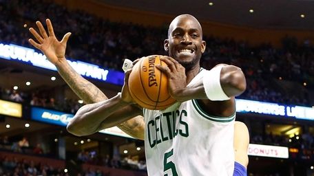 Boston Celtics forward Kevin Garnett grimaces after coming