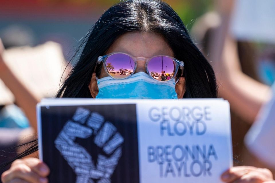 Protesters gather on South Oyster Bay Rd. as