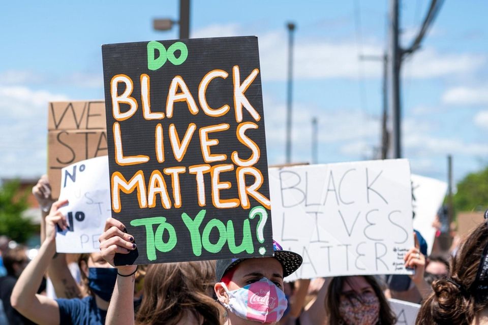 Protesters gather on South Oyster Bay Rd. as