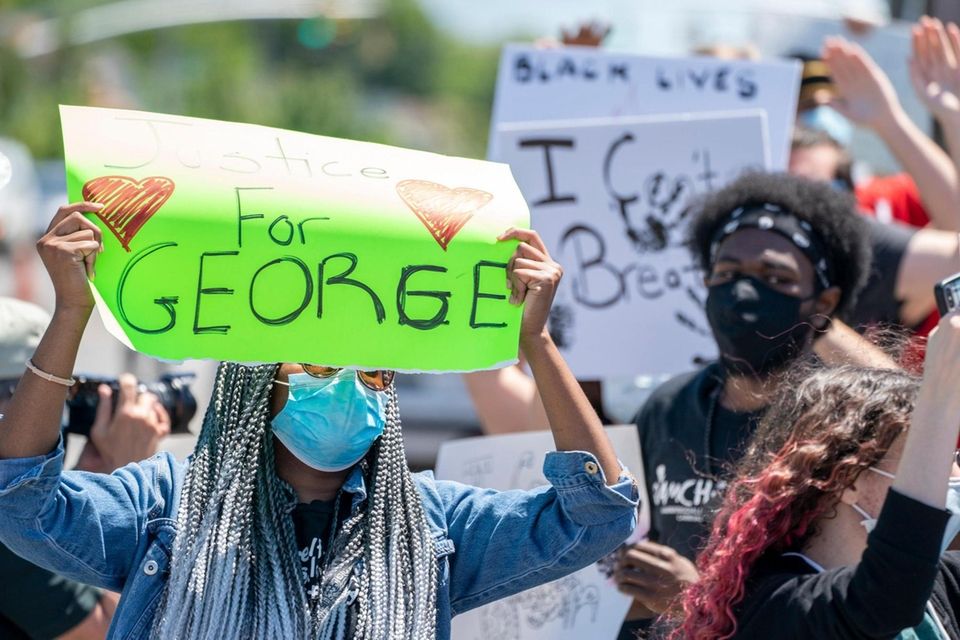 Protesters gather on South Oyster Bay Rd. as