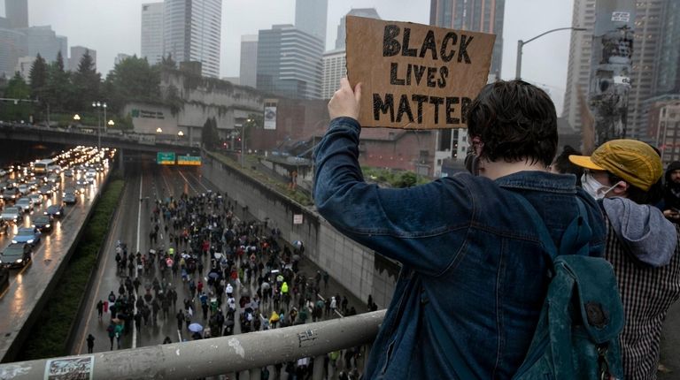 Crowds demonstrate against police brutality on I-5 in