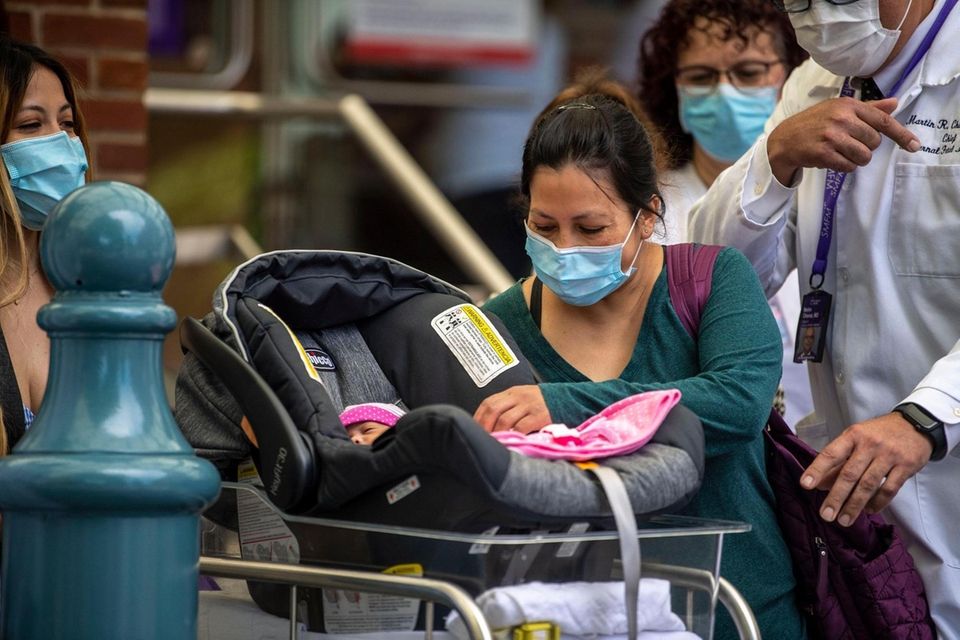 Adriana Torres with her baby daughter Leah, who