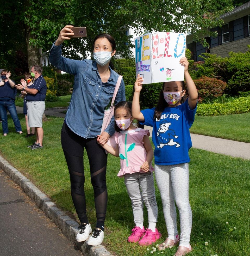 Kyung Nam of Great Neck with her children