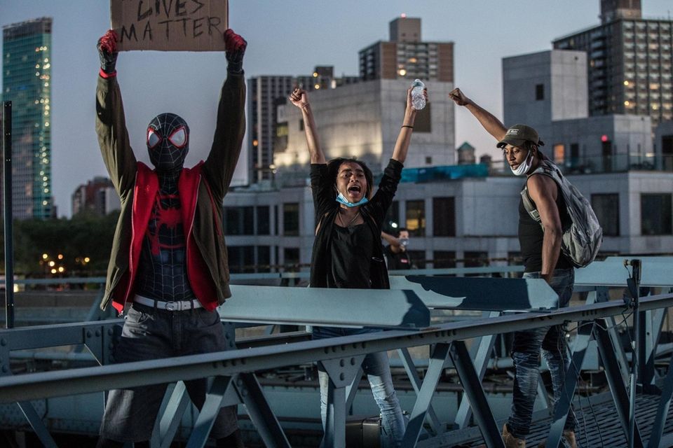 Protestors on Manhattan Bridge during continuing protests stemming