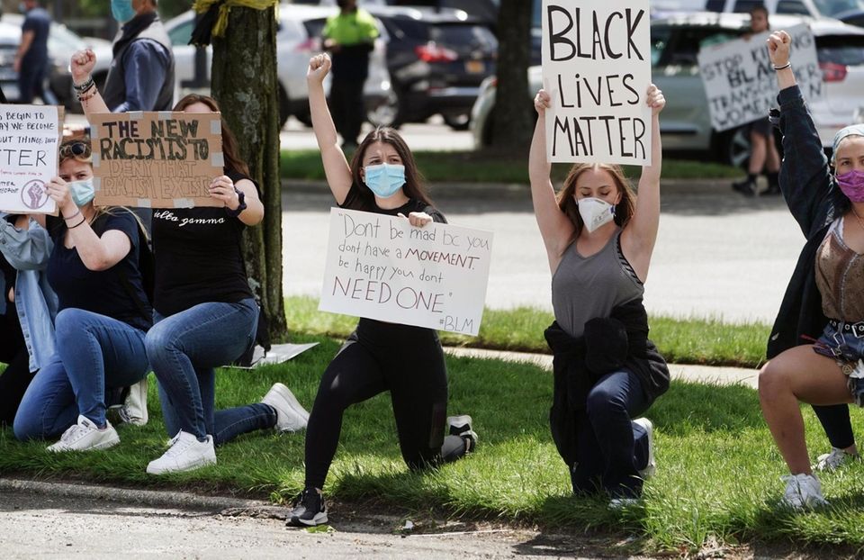 Peaceful demonstrators seeking justice for George Floyd who