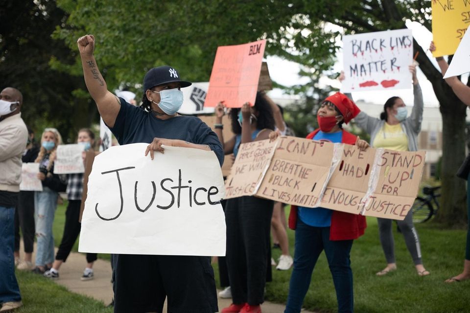 People protest in front of Babylon Town Hall