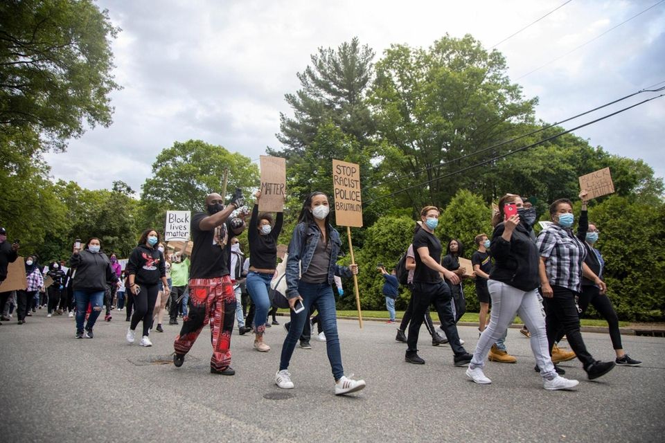Demonstrators demanding justice for George Floyd and others