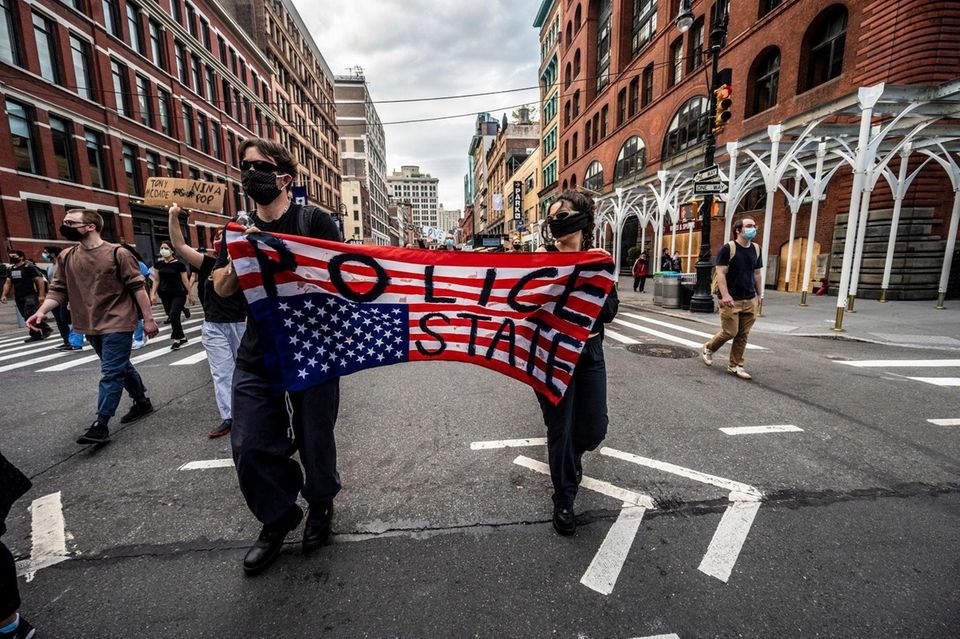 Late night protesters march in downtown Manhattan as
