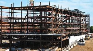 Construction continues on the Belmont Arena on the