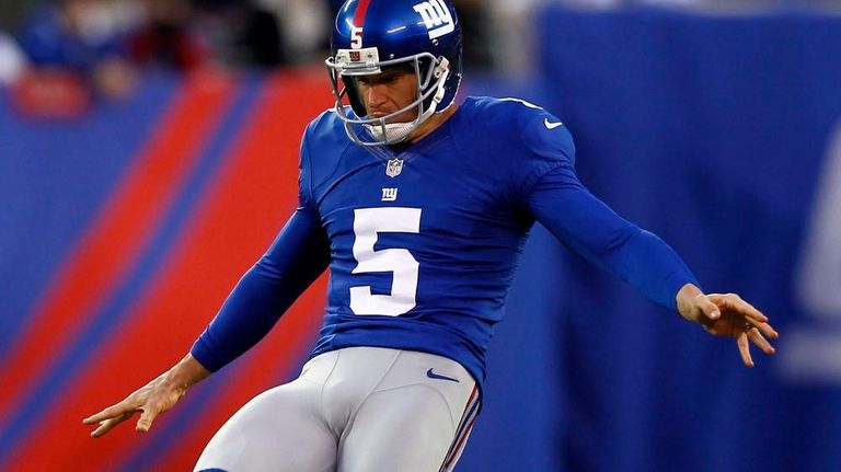 Steve Weatherford of the Giants punts against the