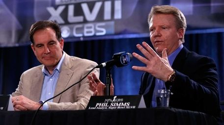 CBS Sports announcers Jim Nantz, left, and Phil