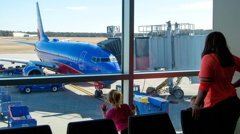 A Southwest plane prepares for departure at Long