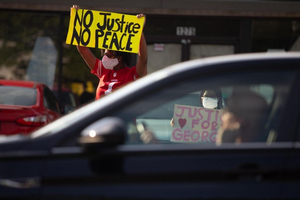 Protesters gather on Front Street in Uniondale to