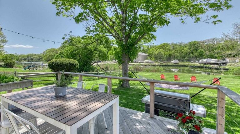The house overlooks Jockey Creek, with bay access.