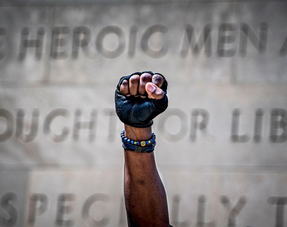 A lone fist representing the sentiments of many