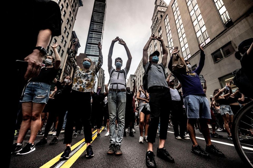 Protestors march in Manhattan during a rally calling