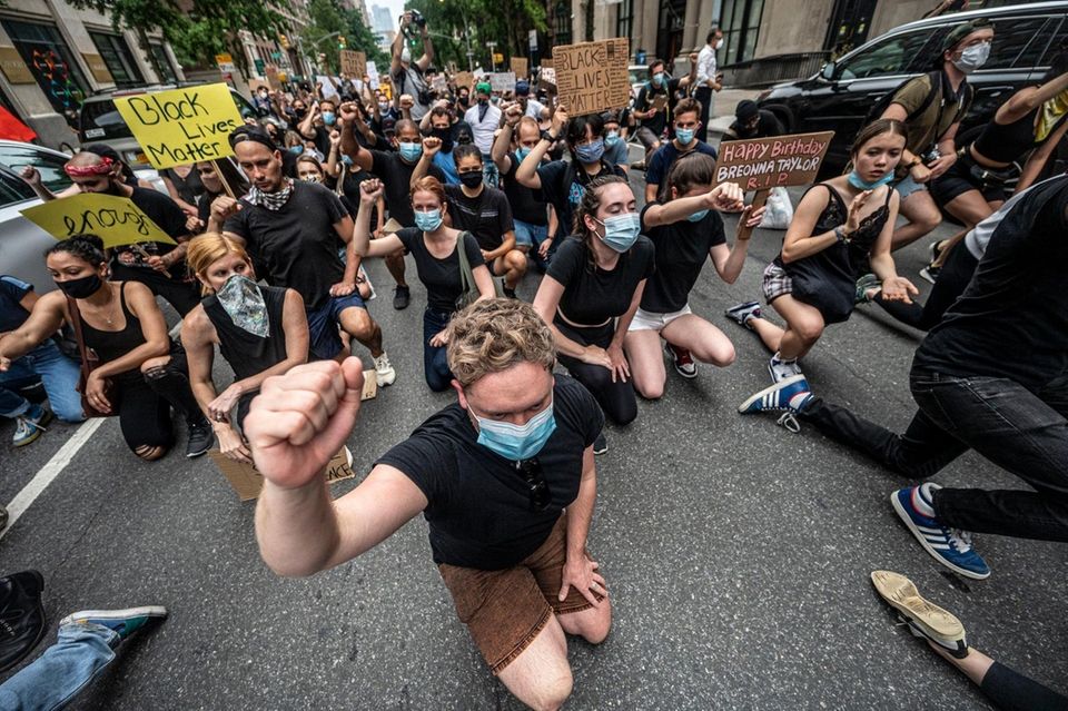 Protestors march in Manhattan during a rally calling