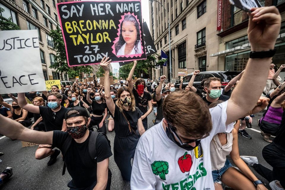 Protestors march in Manhattan during a rally calling