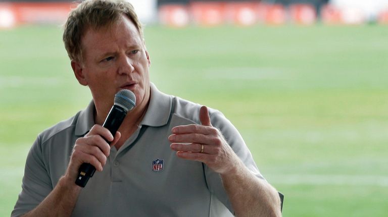 NFL Commissioner Roger Goodell answers questions during a