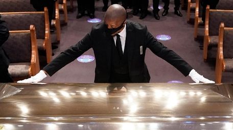 The casket of George Floyd is placed in