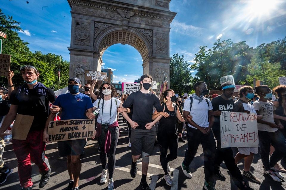 Thousands march up Fifth Ave. for a peaceful