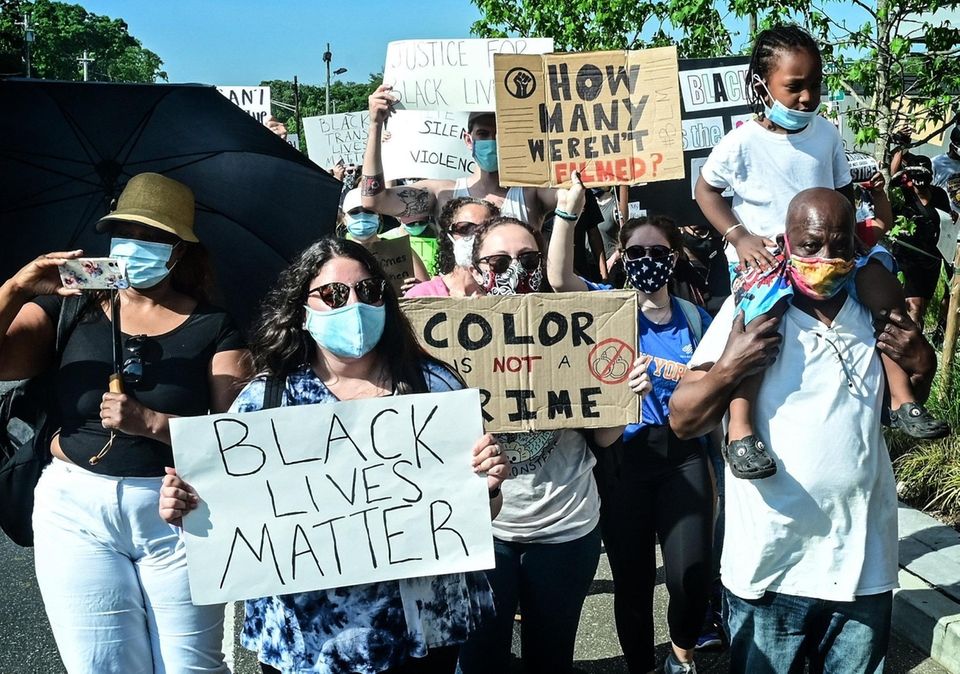 Protesters march up Straight Path in Wyandanch on