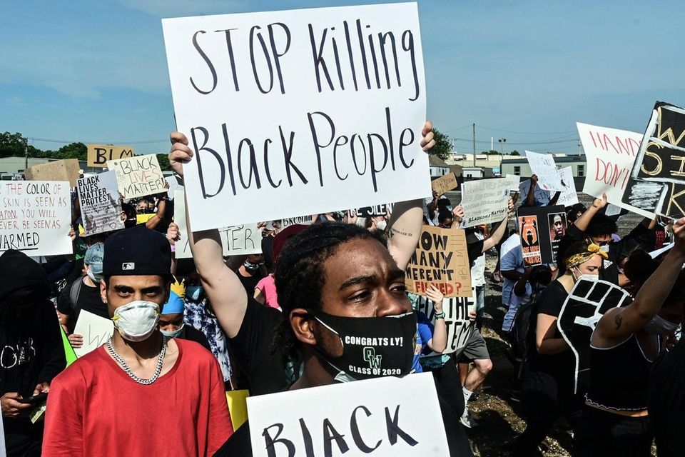 Protestors March up Straight Path in Wyandanch in
