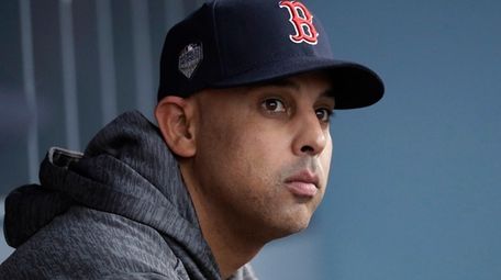 Red Sox manager Alex Cora waits for the