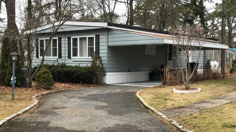 This Riverhead mobile home, listed for $119,900, has