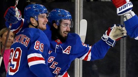 Mika Zibanejad #93 of the Rangers celebrates his